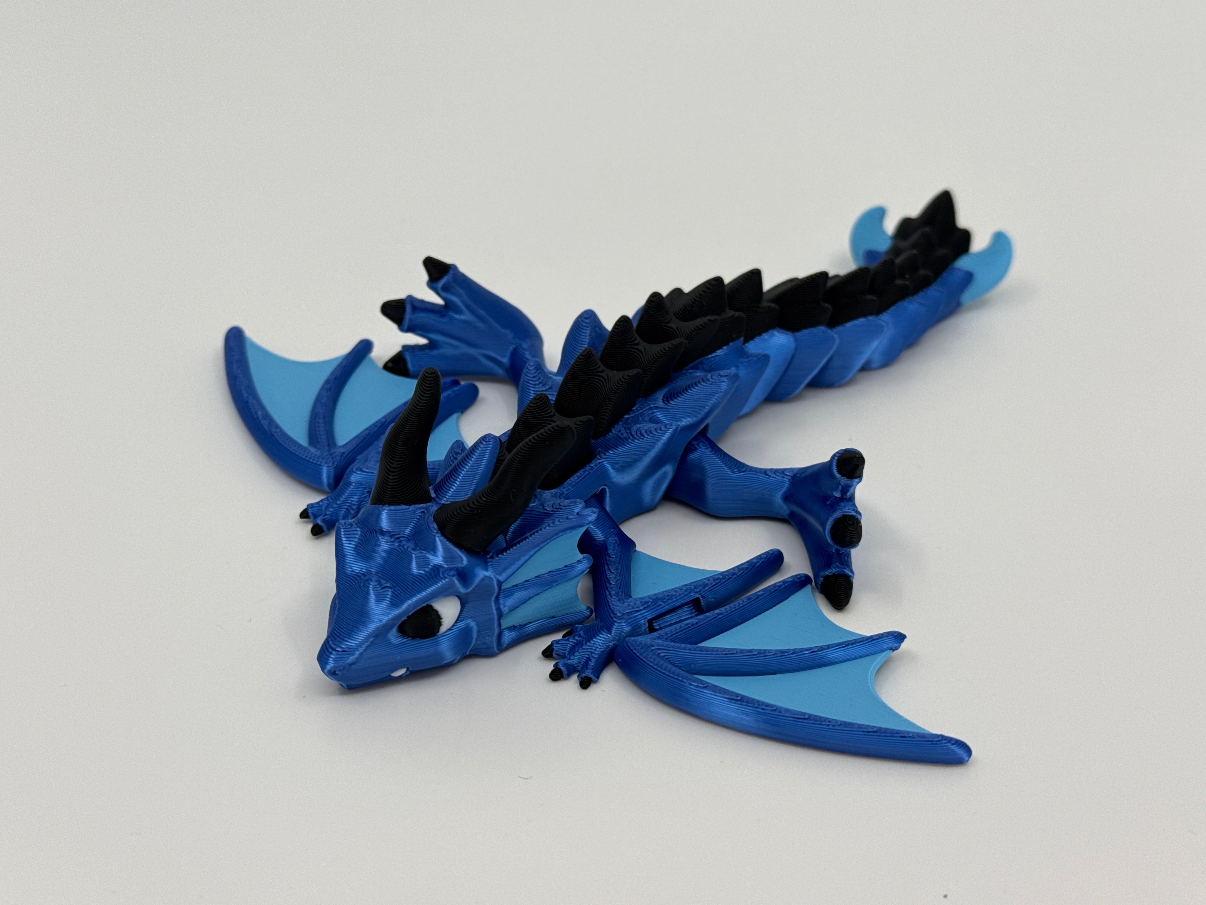 Flexi dragon with flapping wings
