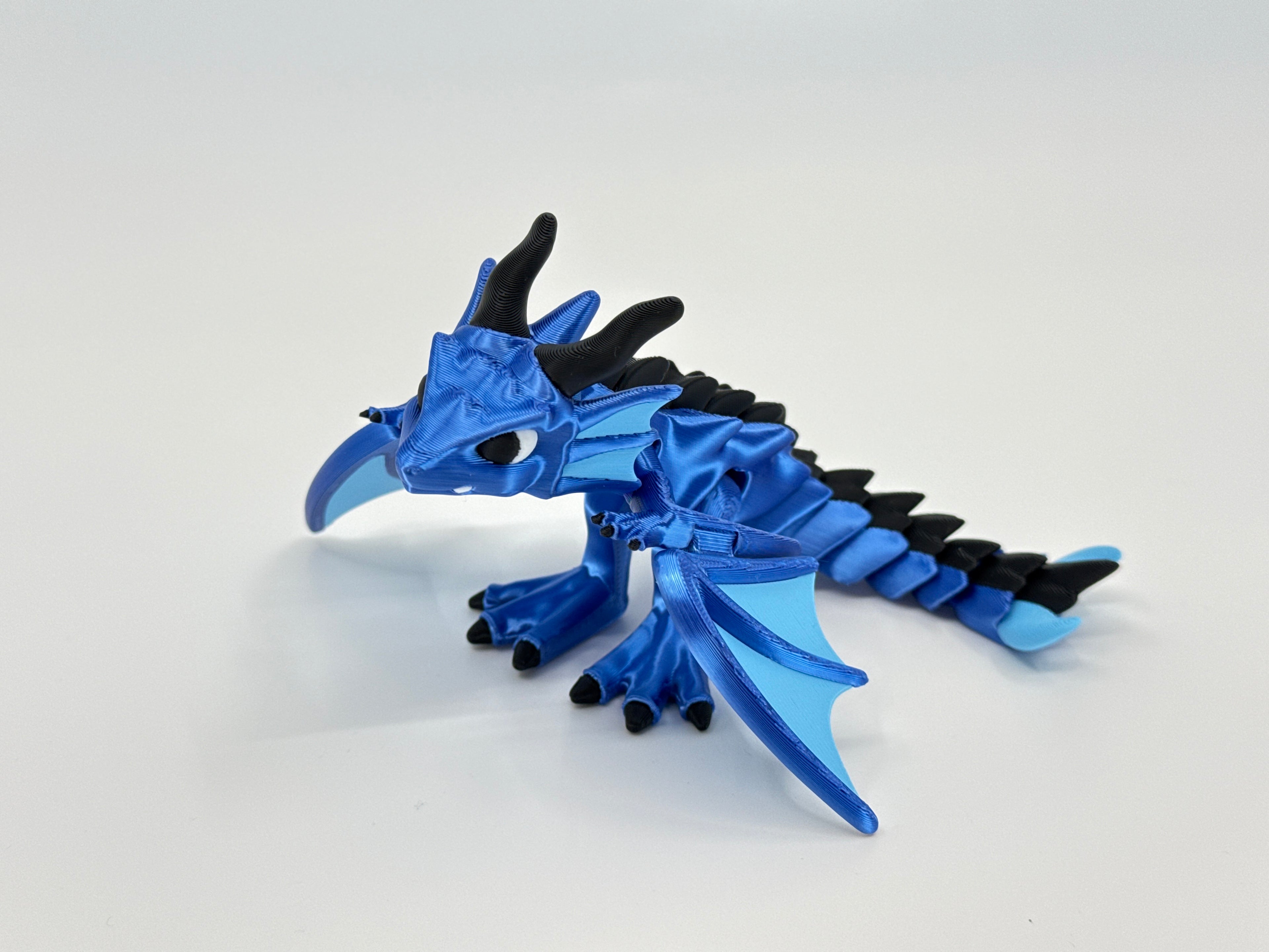 Flexi dragon with flapping wings